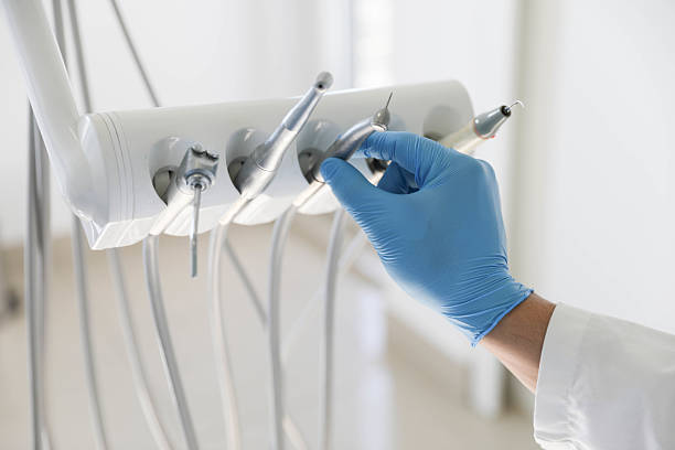 Professional Tooth Extraction technician working in Charlotte Park, FL